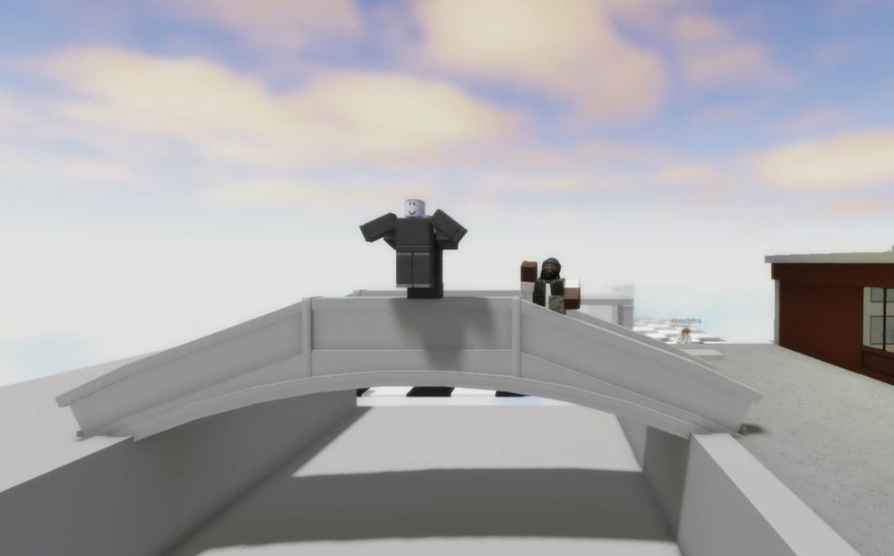 Two Roblox characters on a white arched bridge under a pastel sky