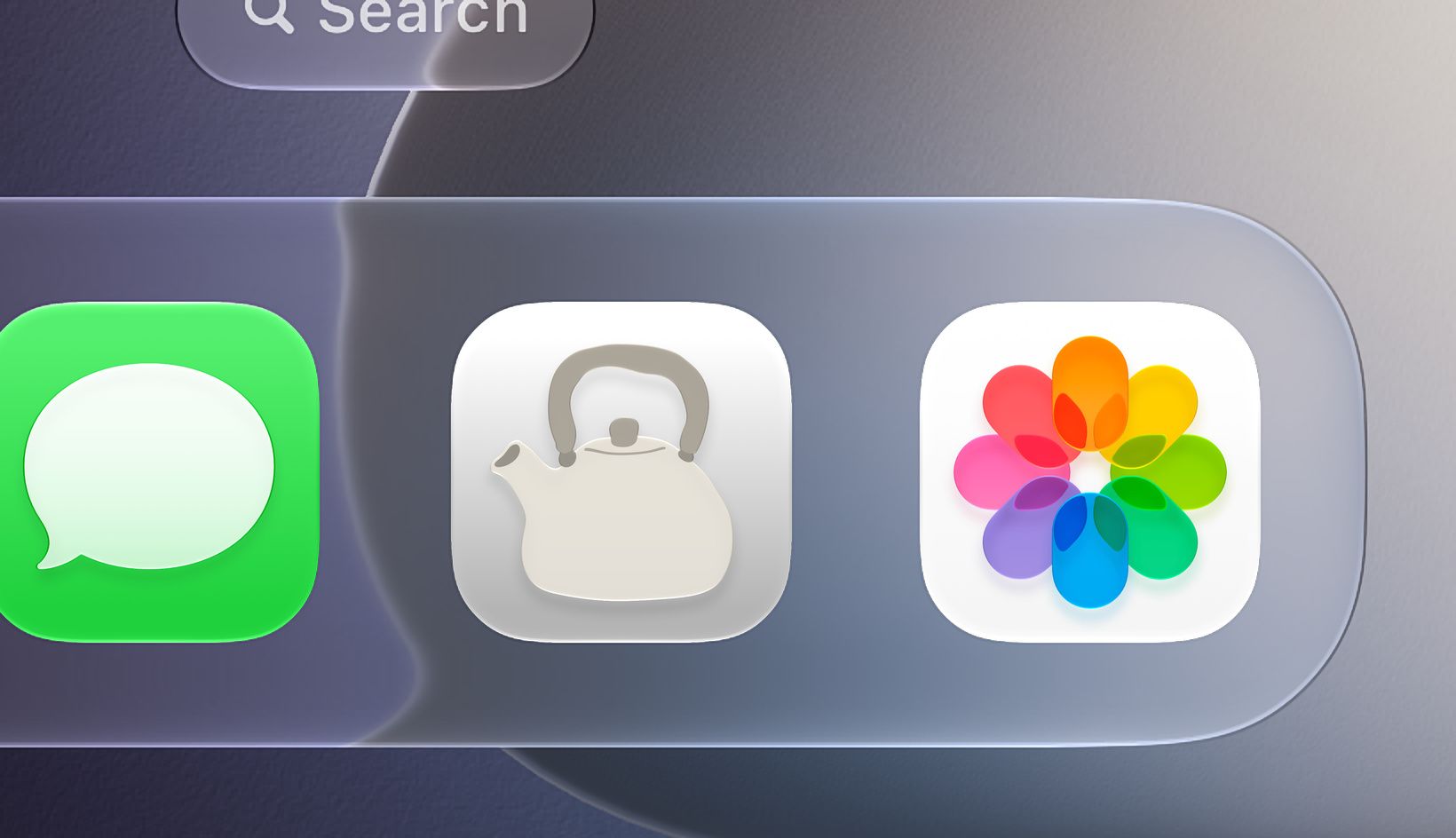 Close on the foot of an iPhone home screen: the Kettle icon, a cream kettle on grey, in the dock between Messages and Photos